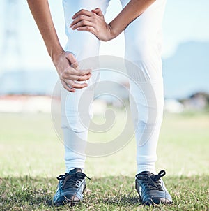 Knee pain, fitness and sports person with legs injury from baseball challenge, grass field workout or exercise. Medical