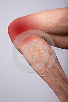 Knee pain, joint injury close up. Ache, hurt, inflammation in leg, strain of muscles