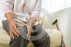 Knee pain of old woman at home, healthcare problem of senior concept