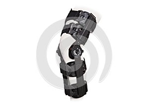 Knee Support Brace on leg isolated on white background. Orthopedic Anatomic. Braces for knee fixation, injuries and pain