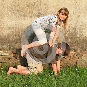 Kneeing kids photo