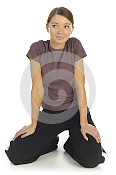 Kneeling woman in tracksuit