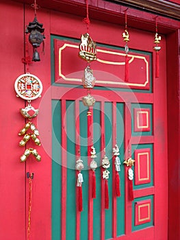 Knick-knacks on a Chinese house door photo