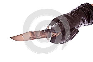 Knife in black glove isolated