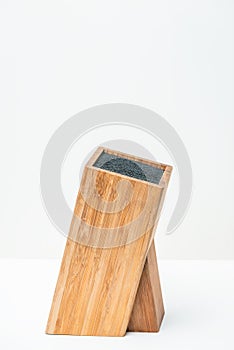 Knife block bamboo isolated single one no knives on it photo
