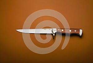 Knife on brown background