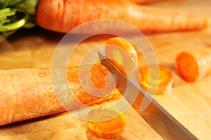 Knife cutting carrots