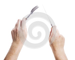 Knife and fork in hands
