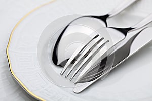 Knife, fork and spoon