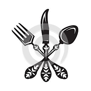 Knife, fork and spoon