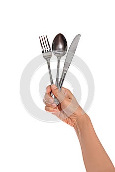 Knife, Fork and spoon held by a woman's hands isolated