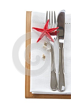 Knife and fork with starfish table setting