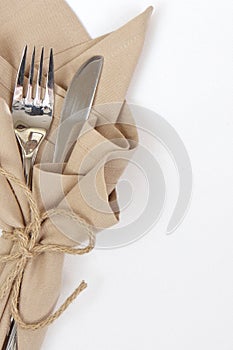 Knife and fork wrapped with string