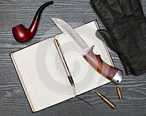 Knife and notebook