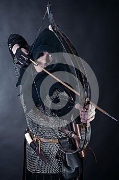 Knight on dark background photo