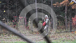 Knight guards a camp in the forest medieval protection  historical