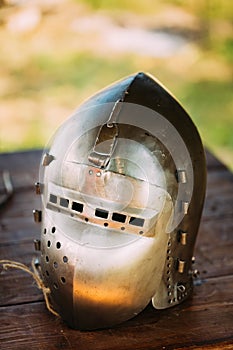 Knight Helmet Of Medieval Suit Of Armour On Table