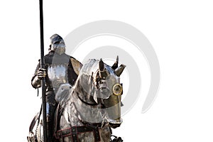 Knight on horseback. Horse in armor with knight holding lance.