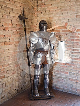 Knight in medieval armor with battle axe