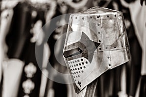 Knight`s medieval metal helmet on peak