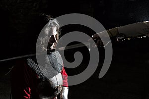 Knighting Ceremony-Brave Young Man Becoming Knight, Black Background photo