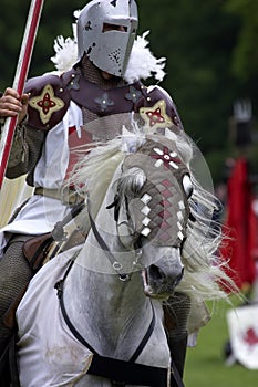 Knights jousting warwick castle England uk photo