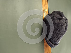 Knit Beanie Hat Hanging On A Hook