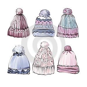 Knit hats with pom pom on white background