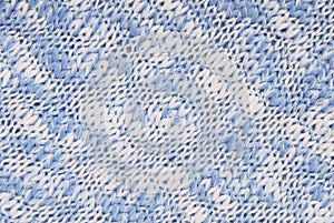 Knitted background, light blue and white colour, melange crocheted backdrop, coarse texture,  soft surface, woollen,