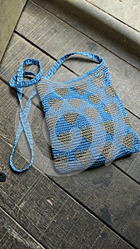 knitted bag on the wooden floor