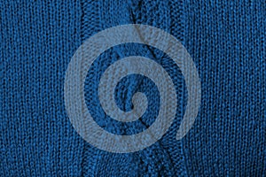 Knitted blue woolen texture.