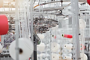 Knitted fabric. Textile factory in spinning production line and a rotating machinery and equipment production company