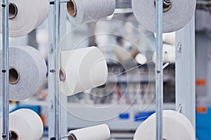 Knitted fabric. Textile factory in spinning production line and a rotating machinery and equipment production company