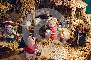 Knitted figurines in a nativity scene