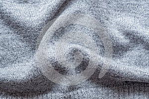 Knitted grey fabric background