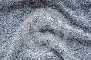 Knitted grey fabric background