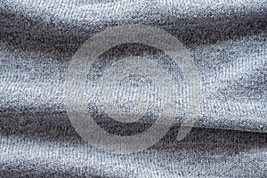 Knitted grey fabric background