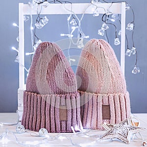 Knitted hats, close-up on a white background