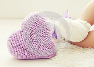 Knitted heart and legs baby in white bootees