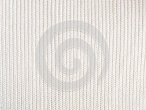 Knitted loops background. Part knitted sweater. Knitted texture. White Knitted Fabric Texture. White knitting wool