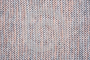 Knitted melange multicolor background from woollen yarns. Texture of a knitted fabric