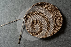 knitted object with a needle