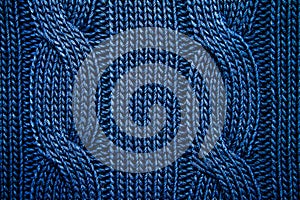 Knitted pattern on woolen clothes, background, wallpaper