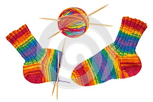 Knitted sock and ball of yarn. Knitting needles. Handmade hobby knitting. Wooden bamboo needles for knitting, sewing