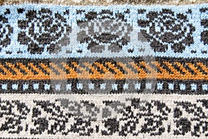 Knitted sweate, fragment. Handmade fabric. Scandinavian style