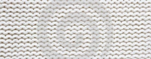 Knitted white fabric texture, reverse stockinette stitch, macro