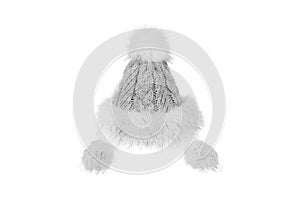 Knitted winter hat with fur isolated on white background
