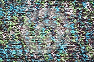 Knitted wool colorful fabric as background