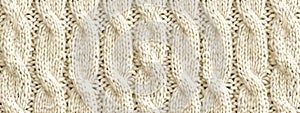 Knitted wool texture, cable stitch pattern, handmade cloth