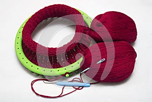Knitted woolen cap on a 36 pegs circular loom